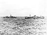 October 26, 1962: The U.S. destroyer <i>Joseph P. Kennedy</i>  stops, boards and inspects the <i>Marucla</i>, a dry-cargo  ship of Lebanese registry under Soviet charter to Cuba.